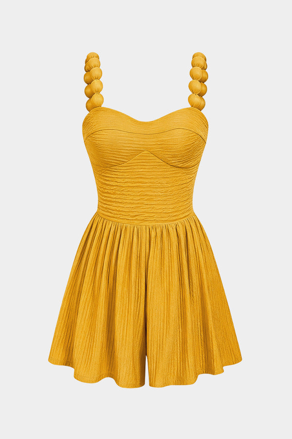 Gestructureerde mouwloze playsuit met rits en ruches