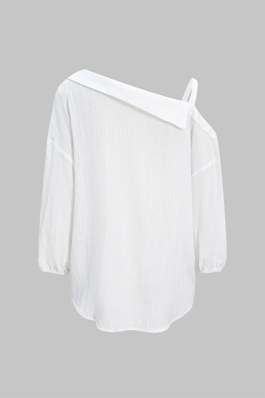Asymmetrische, mouwloze blouse met knoopsluiting en open rug