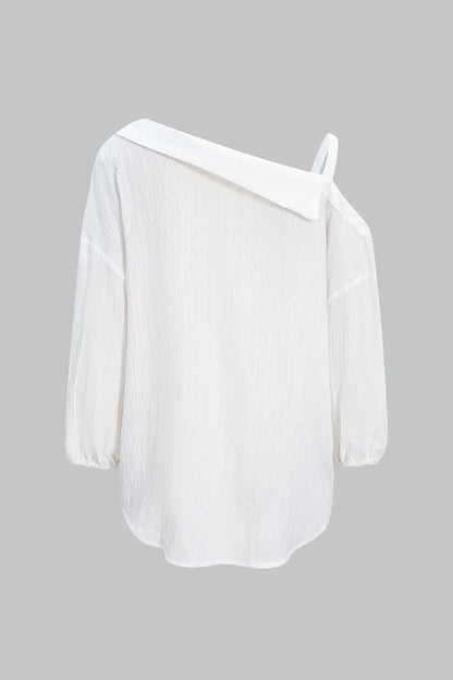 Asymmetrische, mouwloze blouse met knoopsluiting en open rug