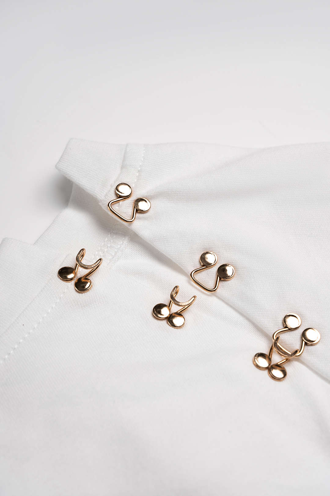 Metallic T-shirt met gesp, ronde hals en korte mouwen