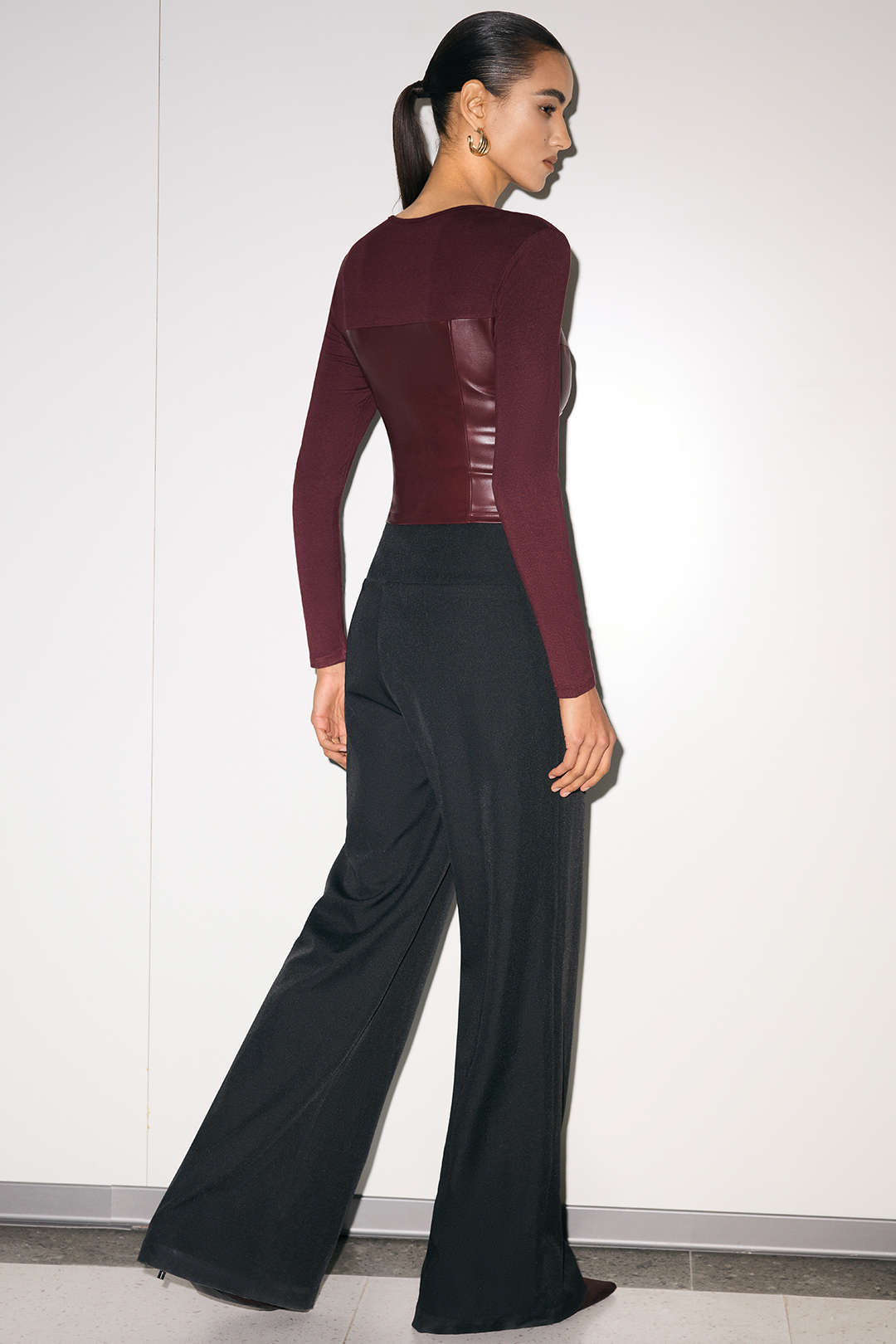 Leren-look patchwork top met rits en lange mouwen