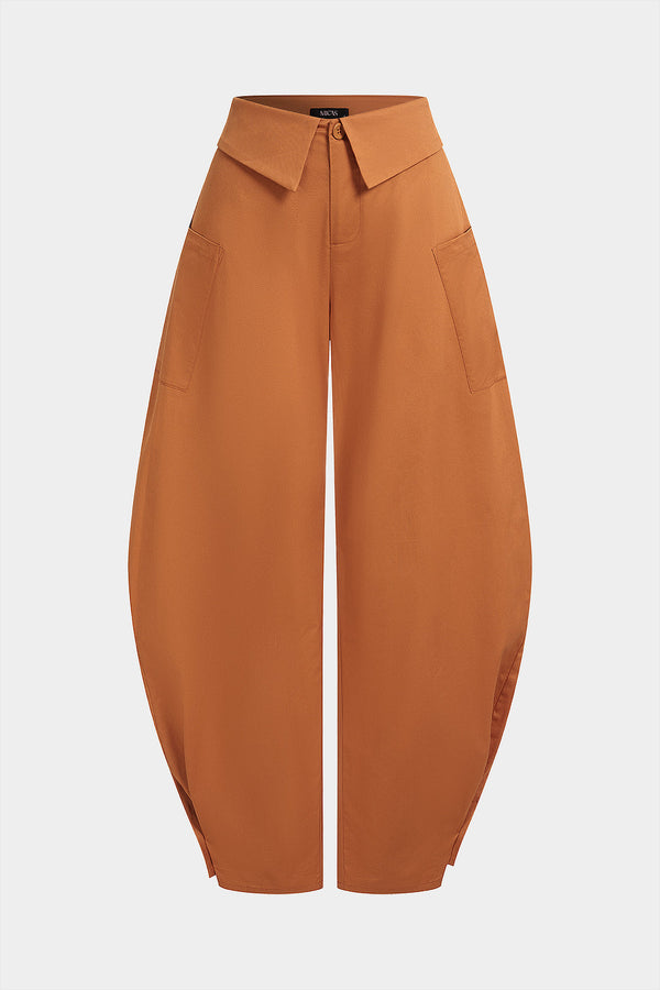 Effen broek met zakken, knoopjes en wijde pijpen