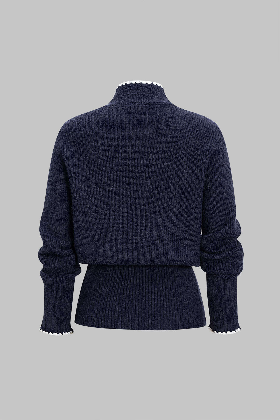 Gebreid vest met knoopjes en strik