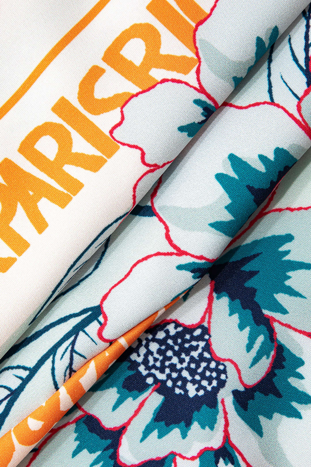 Bloemenprint minirok met knoopdetail en wikkelmodel