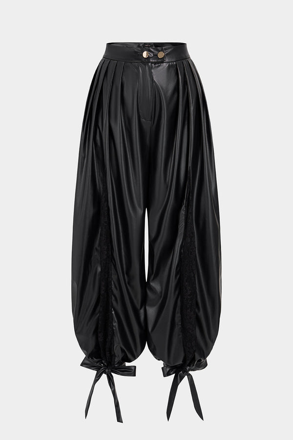 Leren-look broek met knoopjes, ruches en strik