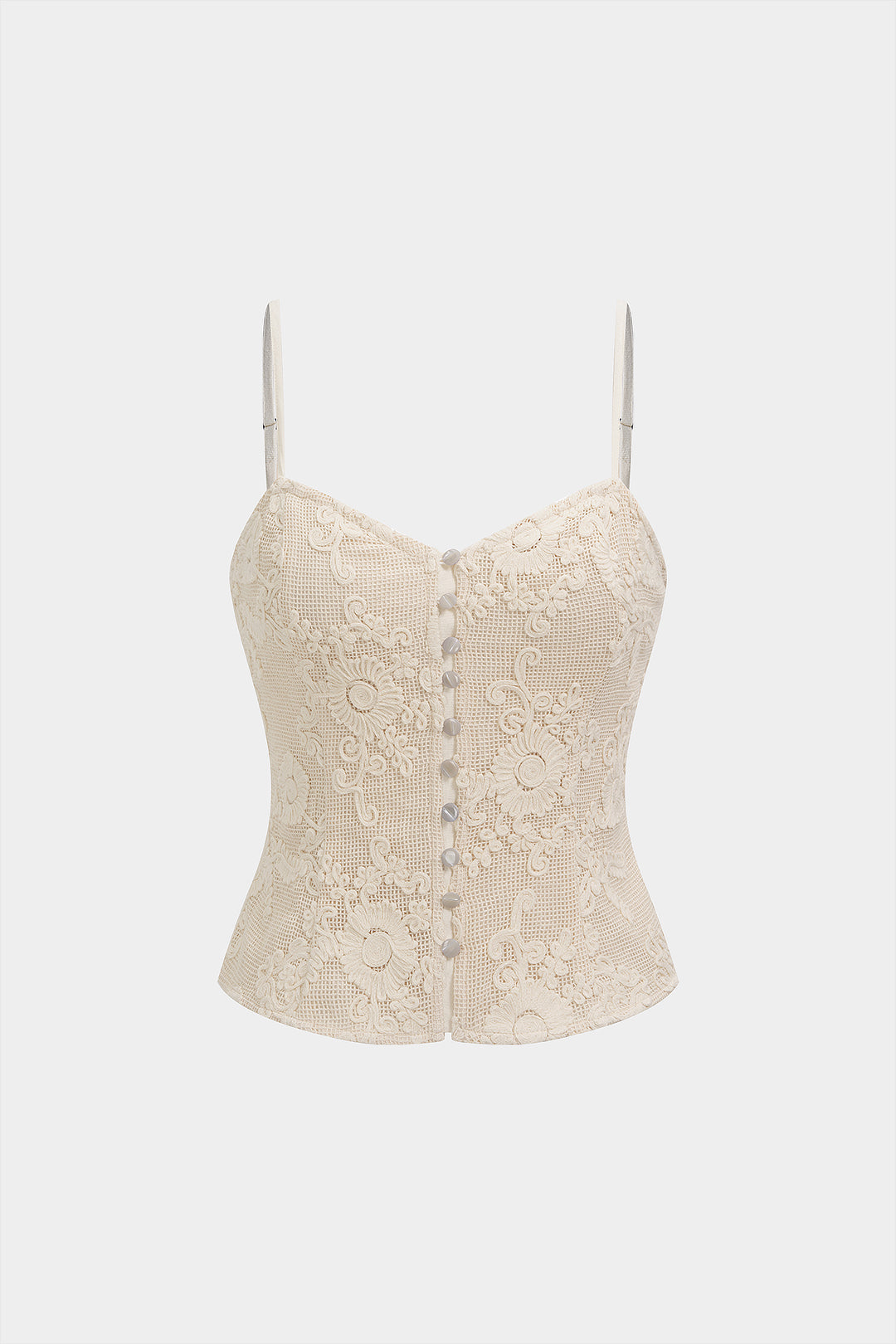 Patchwork top met knoopjes en borduursel