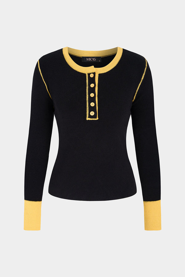 Thea - Gebreide top met knoopjes en lange mouwen