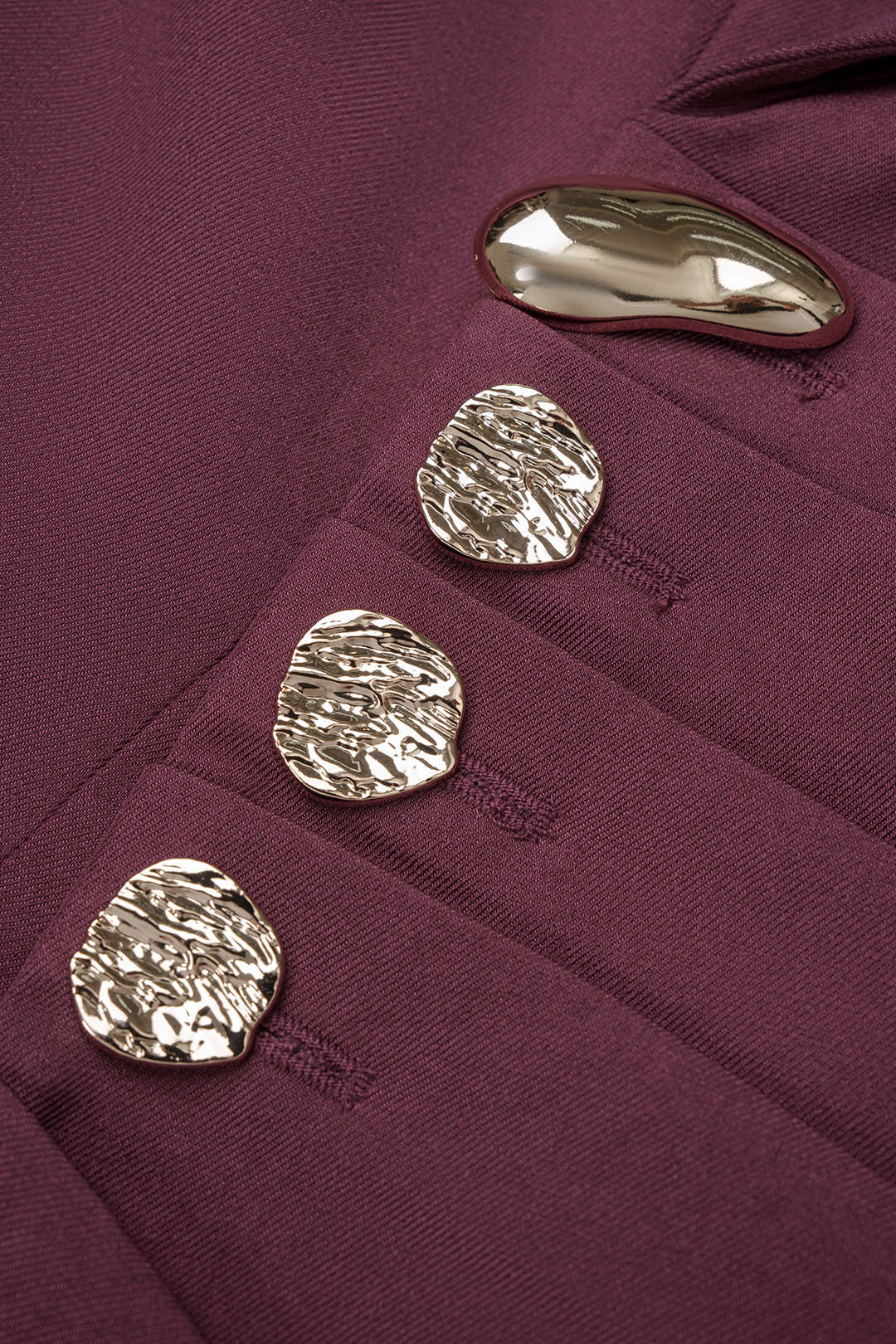 Metallic minijurk met reverskraag, knoopjes en ruches