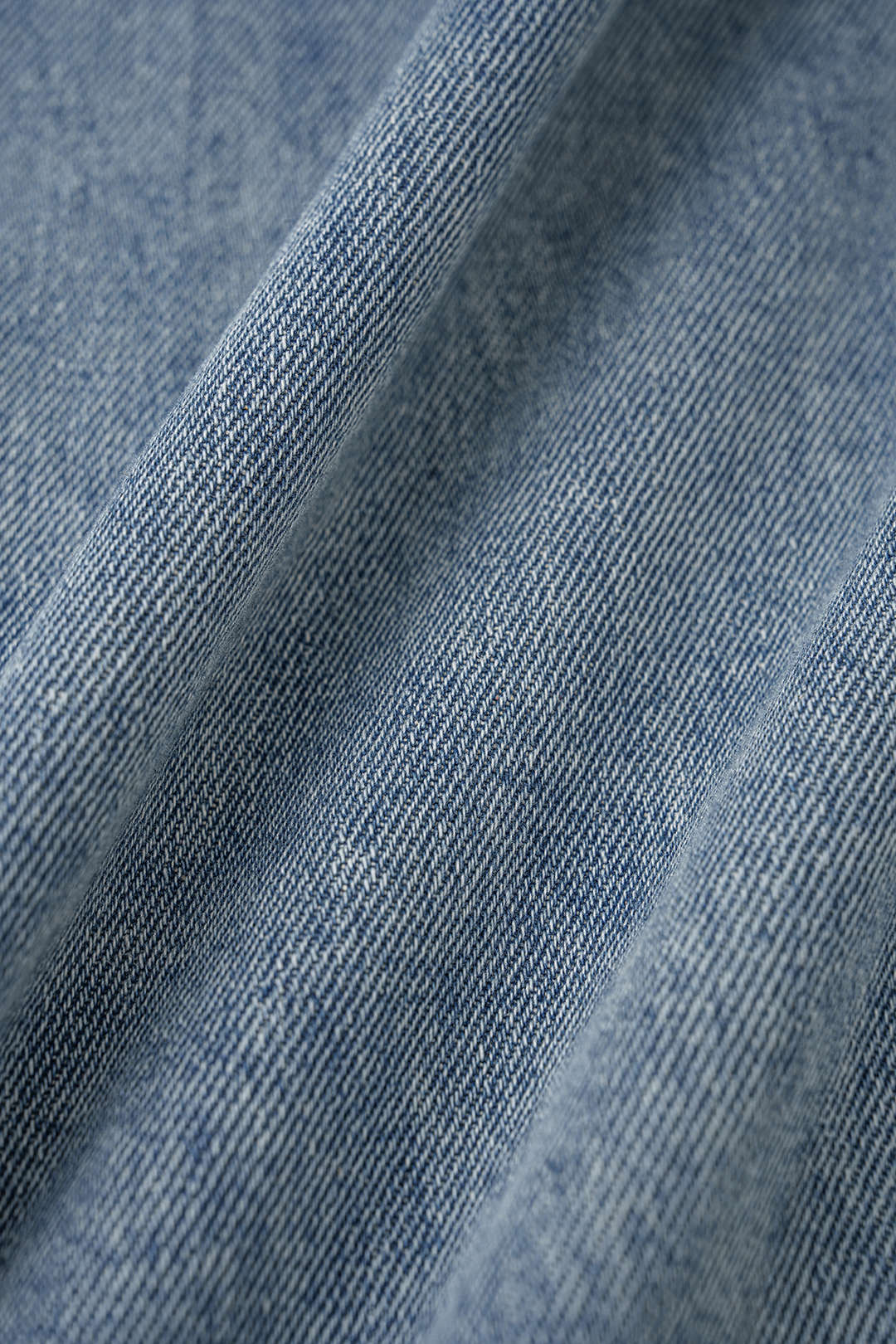 Dana - Asymmetrische jeans met wijde pijpen
