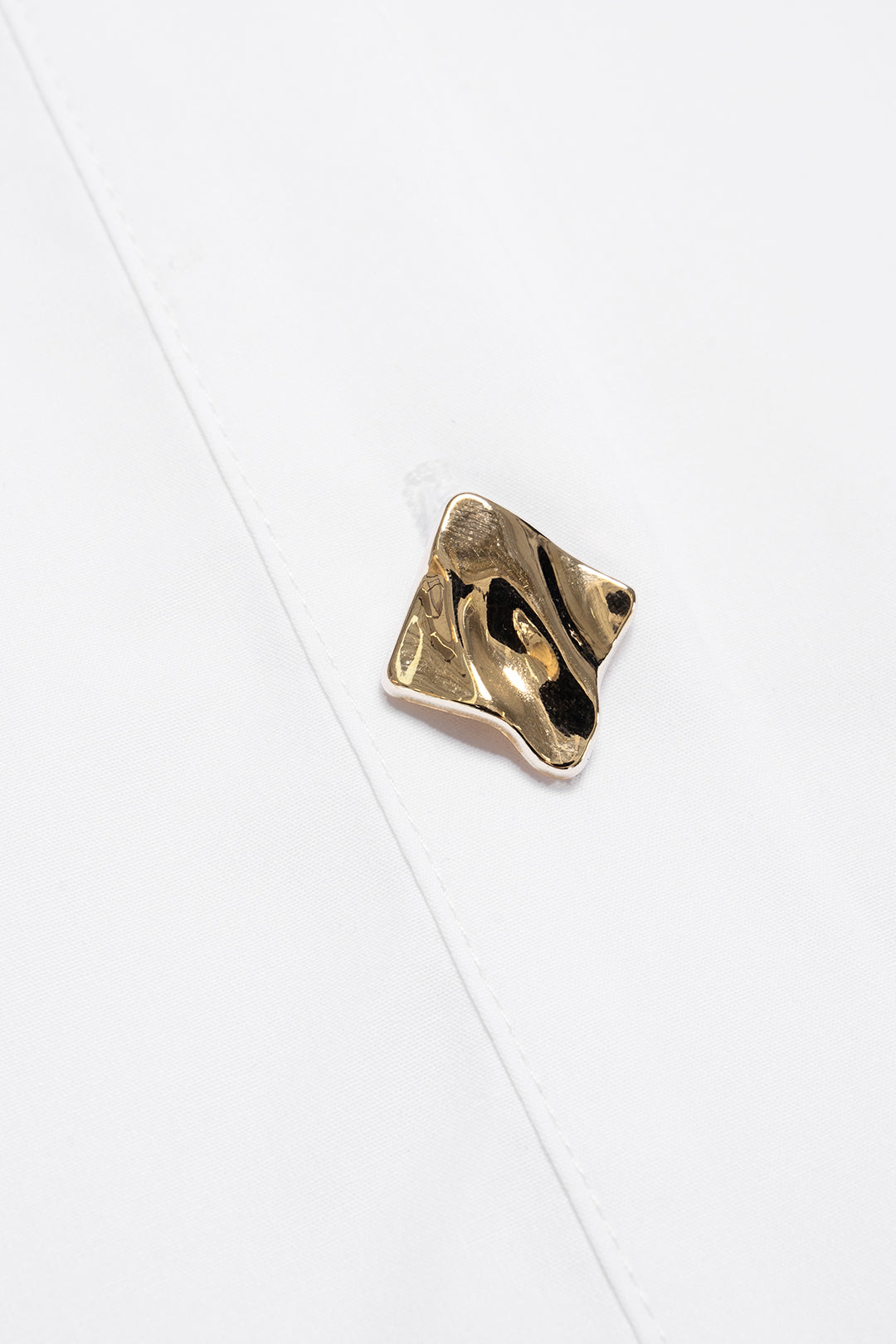 Patchwork metallic blouse met kanten rand en knoopjes