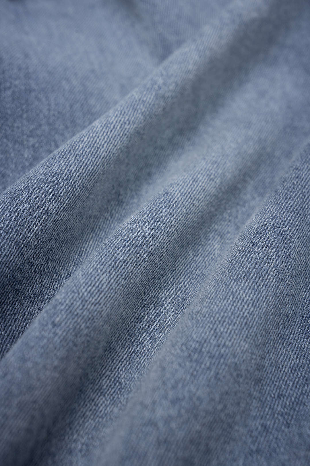 Denim jumpsuit met knoopjes, trekkoord en zakken