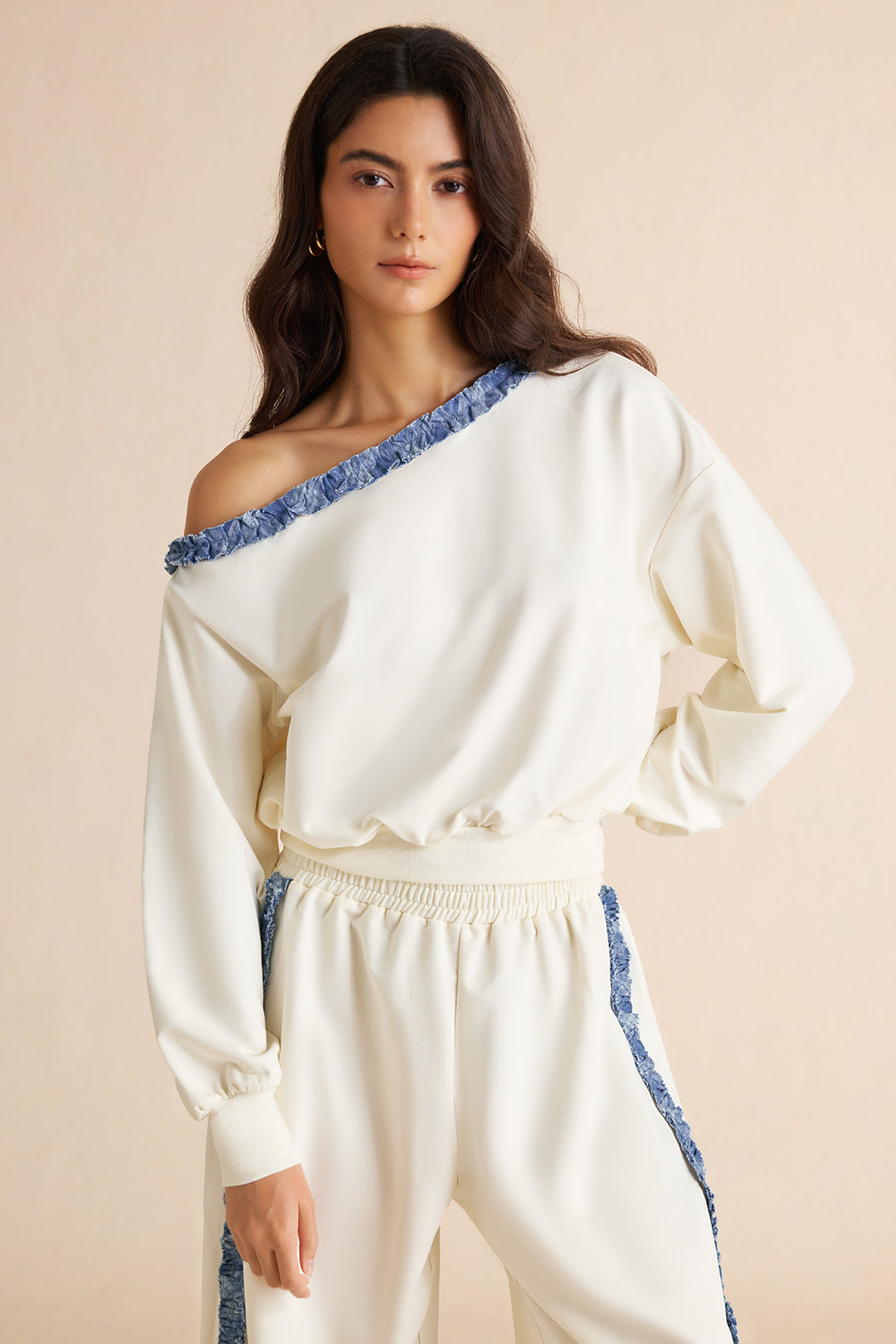 Patchwork denim sweater met één schouder
