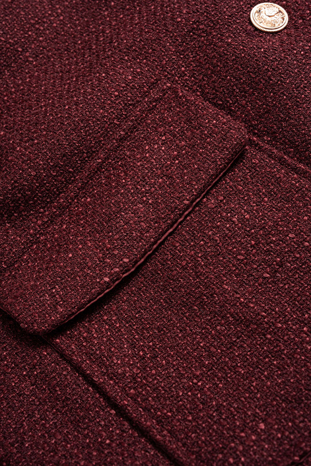 Tweed metallic top met ronde hals, knoopjes en zakken