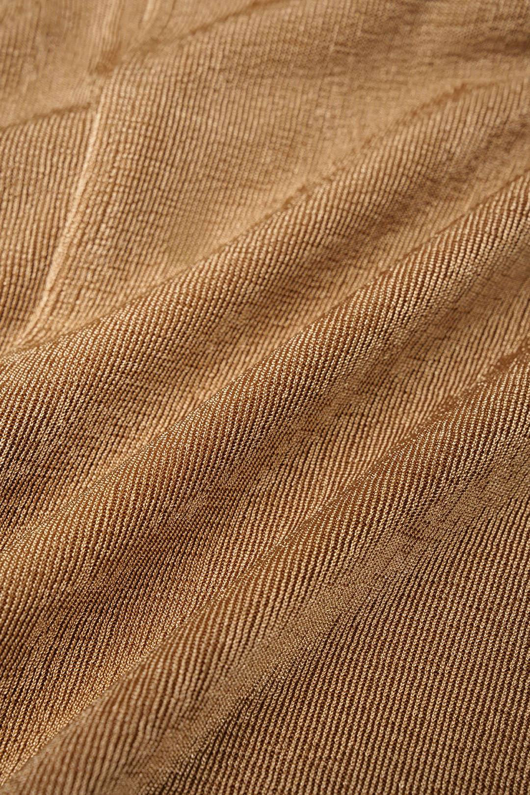 Metallic asymmetrische body met gedraaid detail