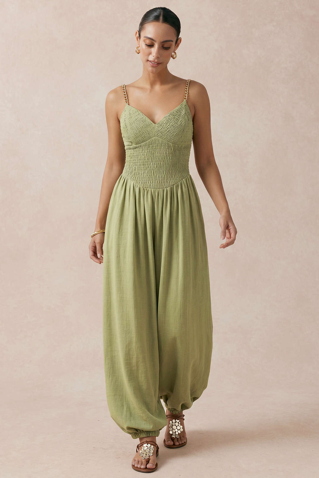 Metallic mouwloze jumpsuit met kettingdetail en V-hals