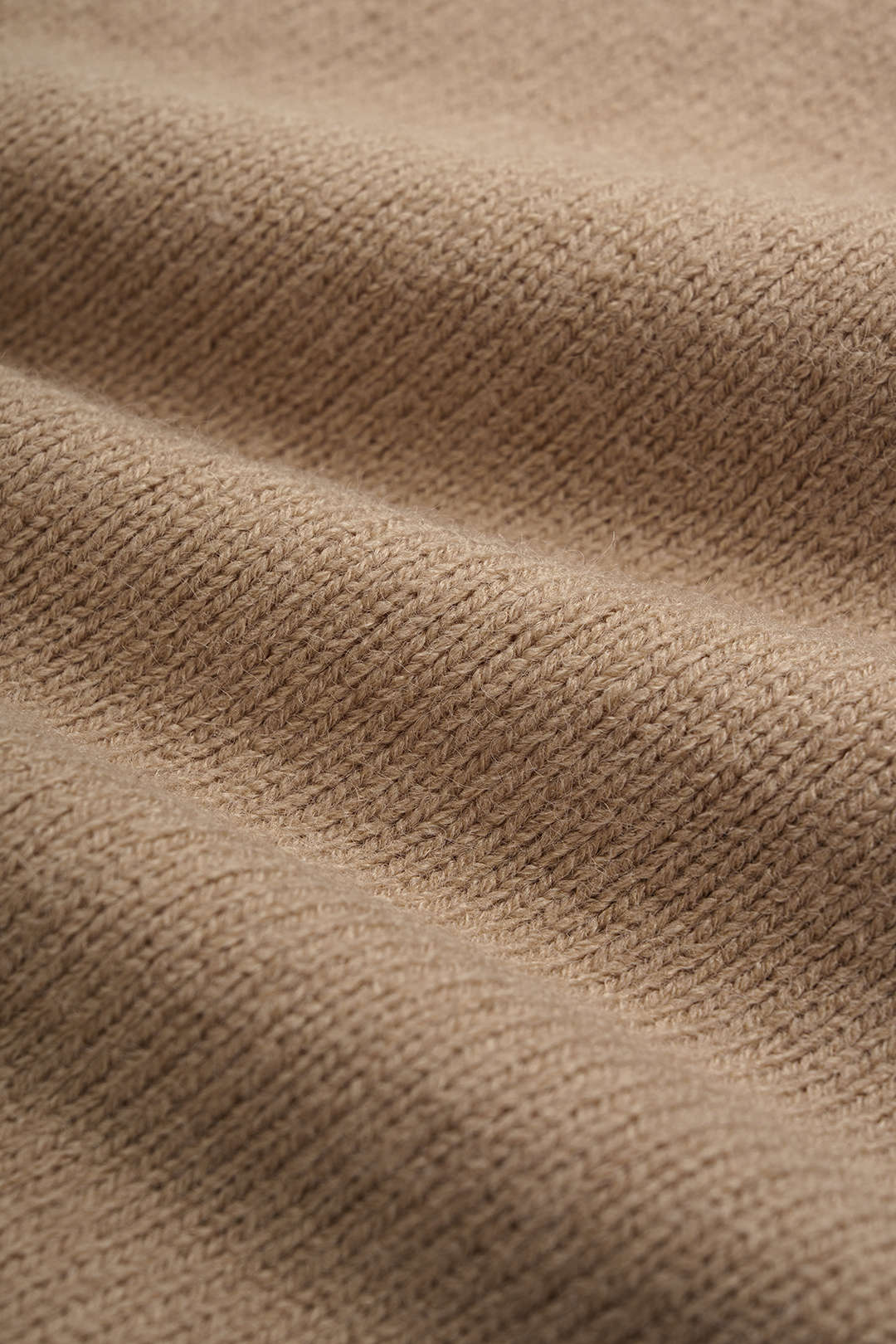 Uma - Gebreide top met V-hals, gedraaid detail en knoopdetail