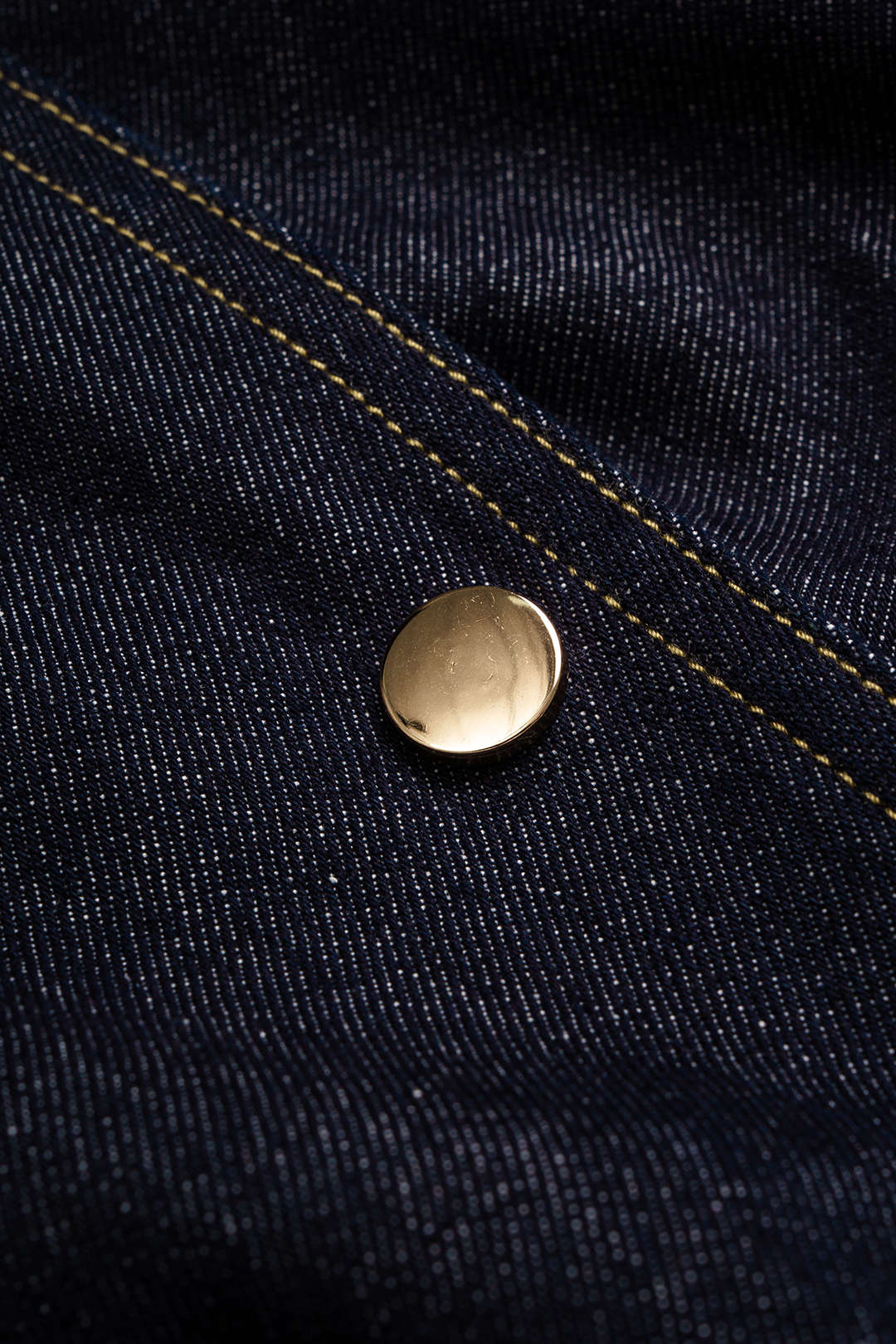 Denim asymmetrisch jasje met revers en riem