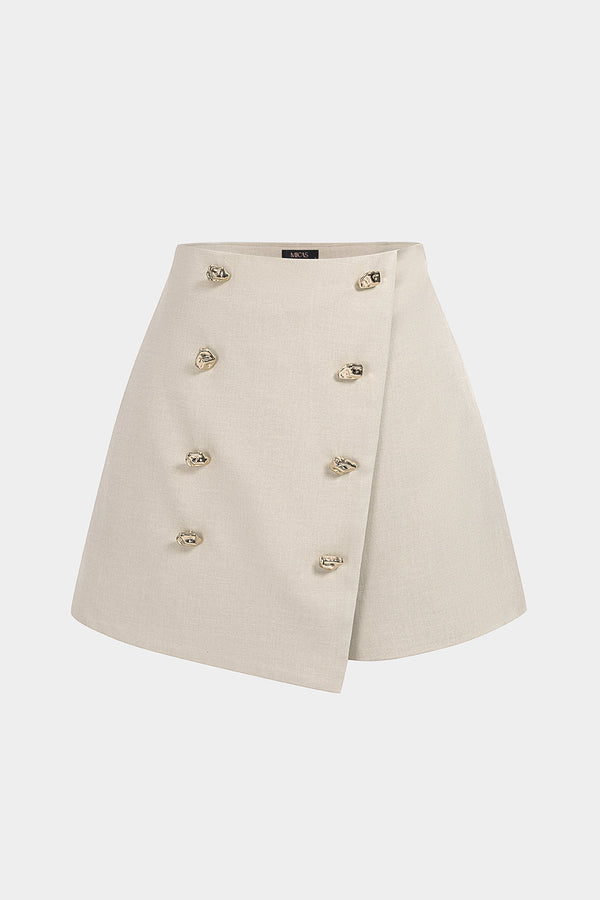 Asymmetrische metallic skort met knoopjes