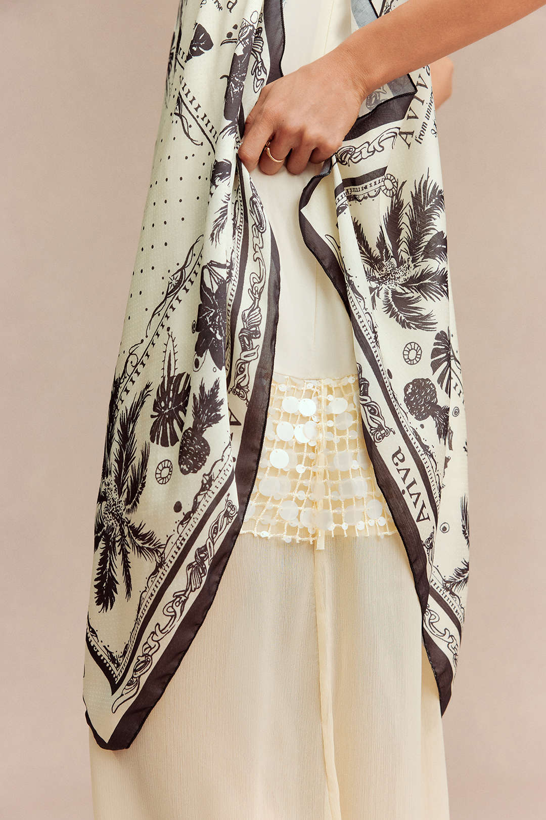 Patchwork mouwloze midijurk met pailletten en kralen