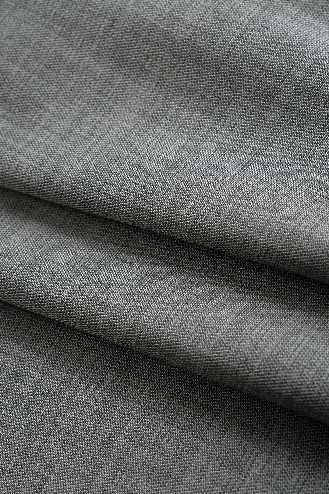 Asymmetrische minijurk met reverskraag, riem en lange mouwen