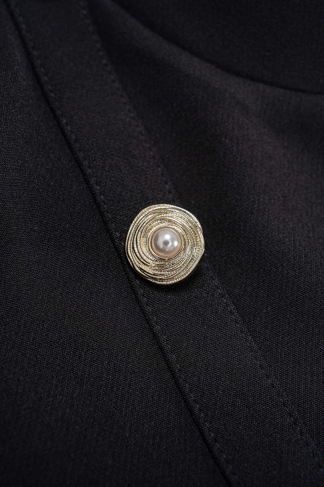 Metallic top met kettingdetail en rits