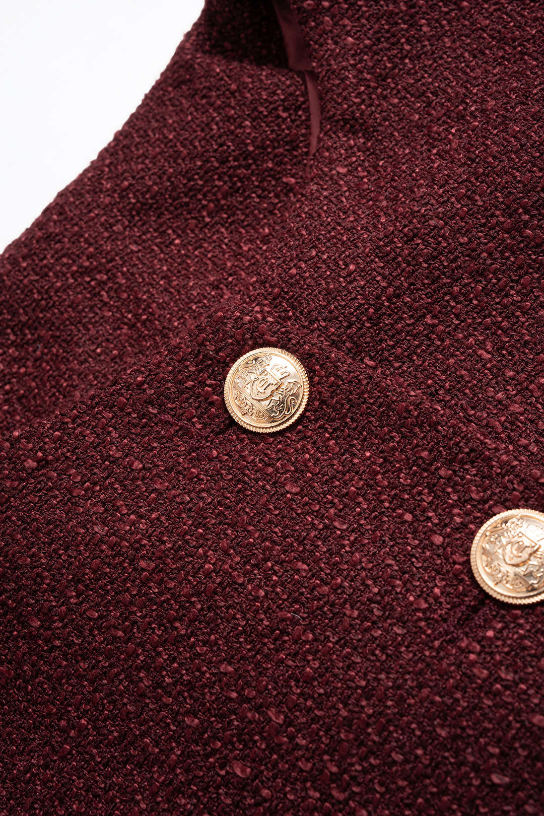 Tweed metallic top met ronde hals, knoopjes en zakken