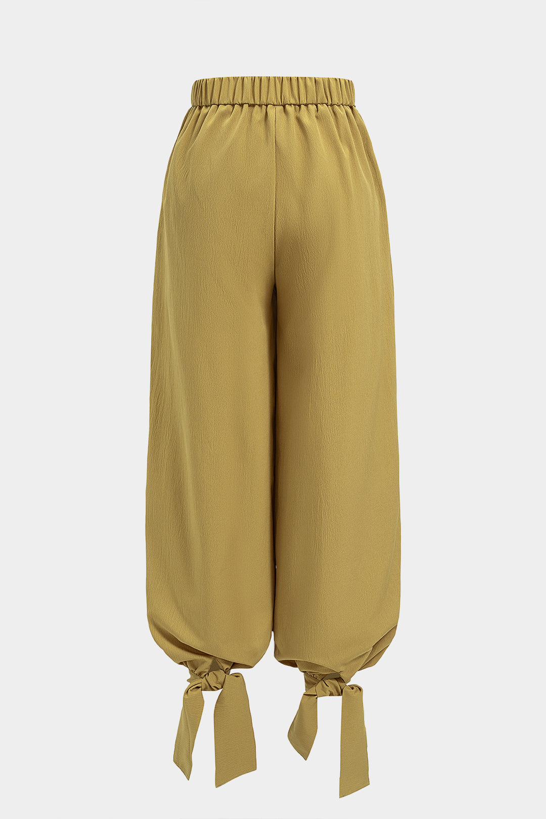 Broek met ruches en strik