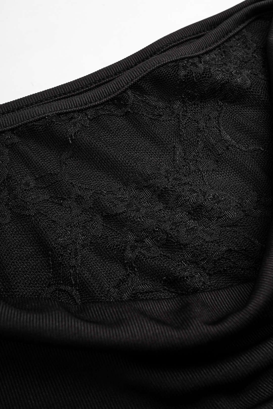 Patchwork body met kant, één schouder en drapering