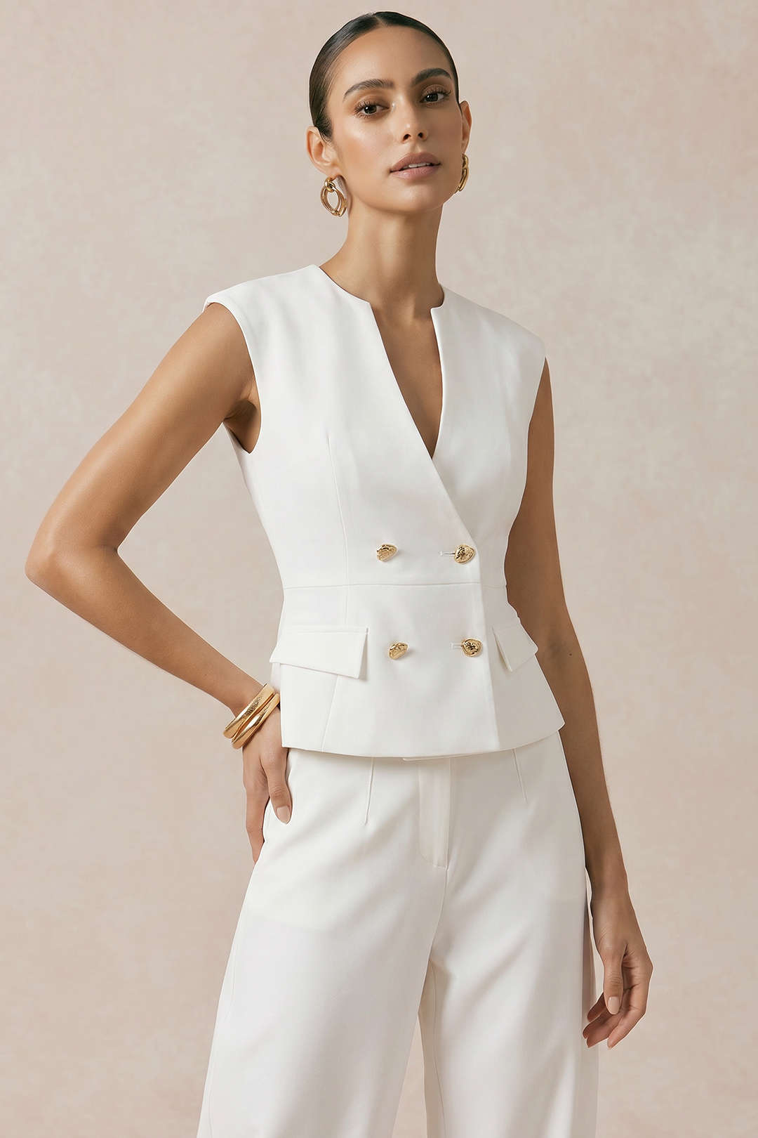 Metallic gilet met knoopjes en V-hals