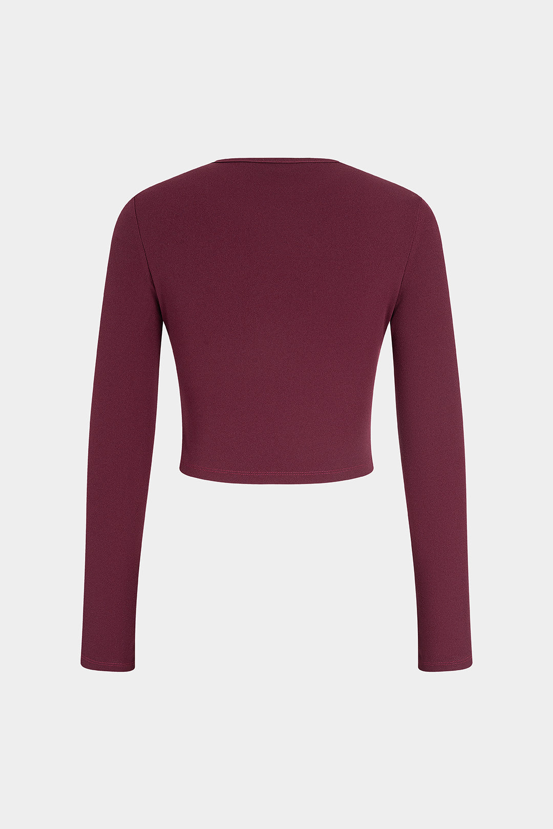 Metallic top met ronde hals, uitsnijding en lange mouwen
