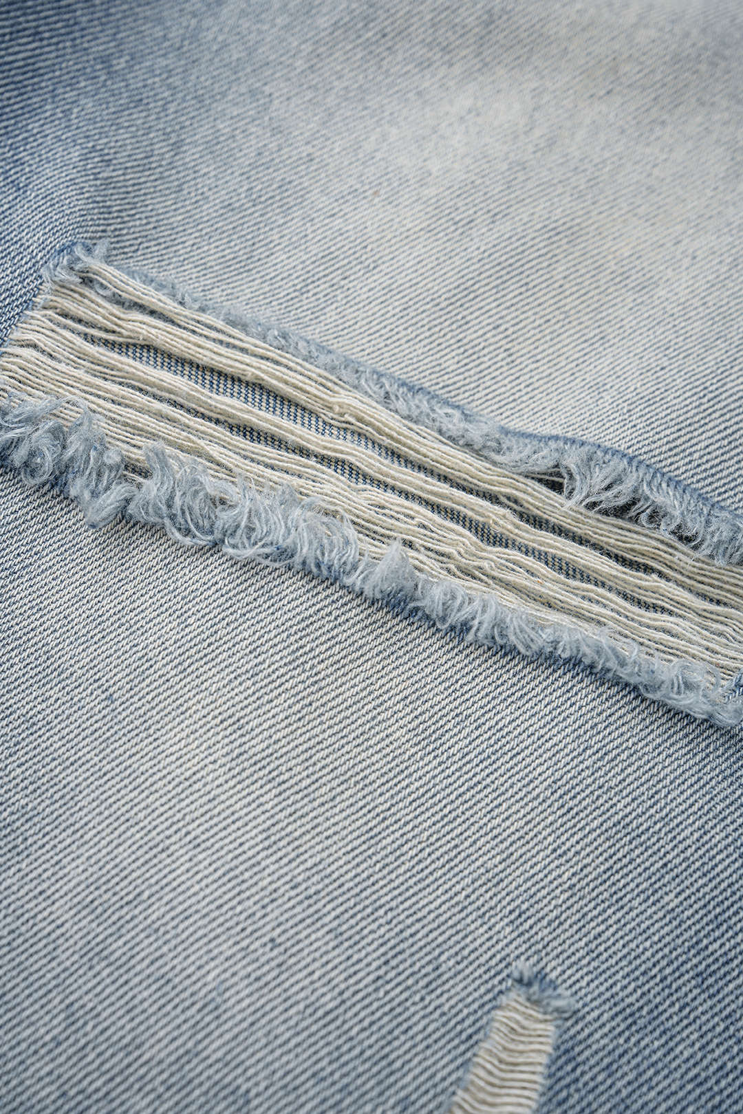 Dana - Asymmetrische jeans met wijde pijpen