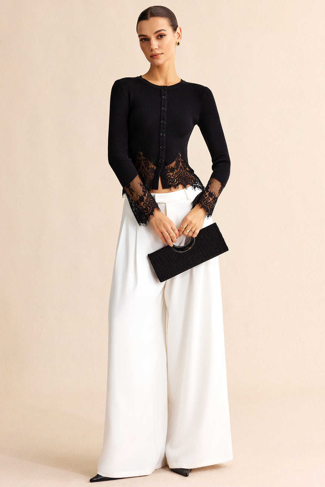 Noa - Gebreide patchwork top met kanten rand en lange mouwen