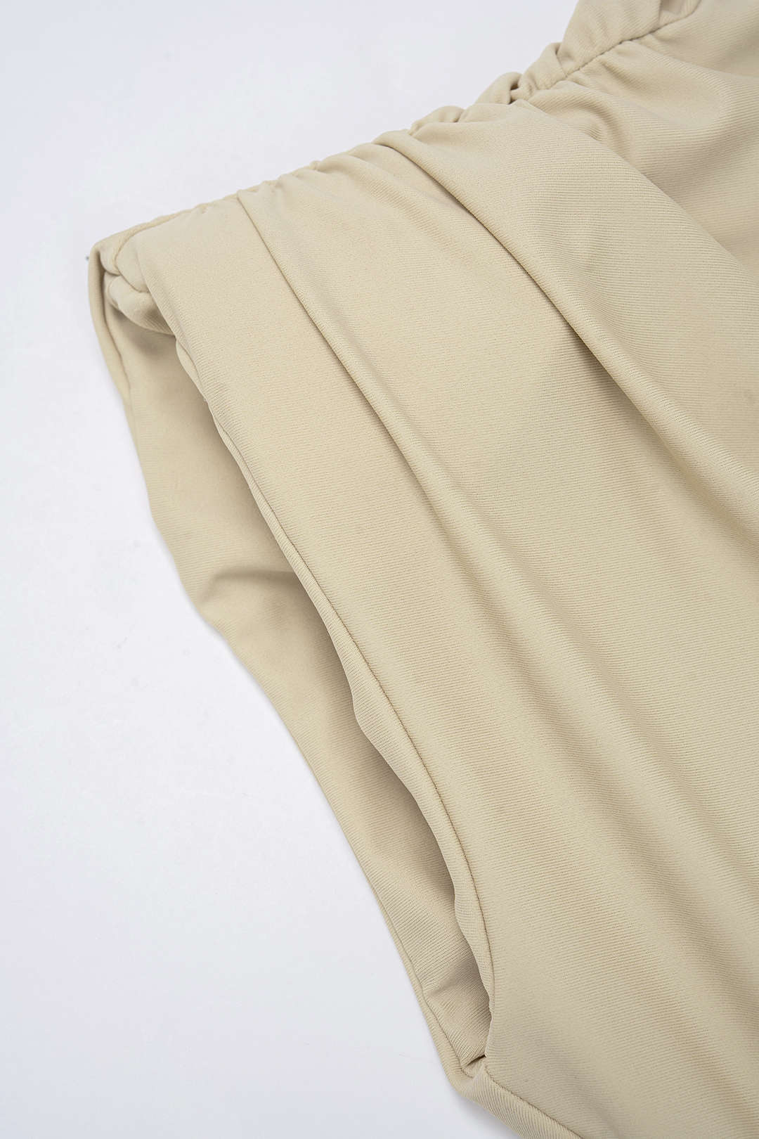 Mouwloze minijurk met riem