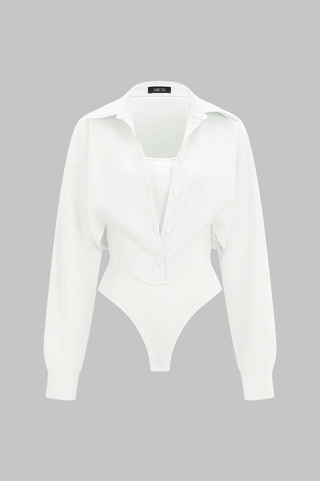Mae - Patchwork body met knoopjes en lange mouwen