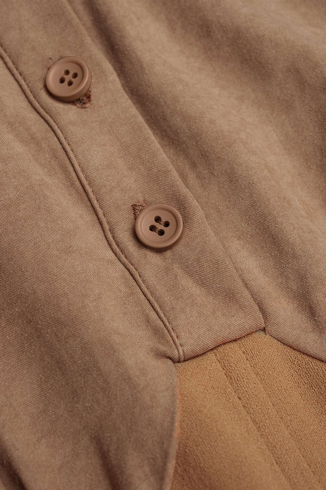 Liv - Patchwork body met knoopjes en lange mouwen