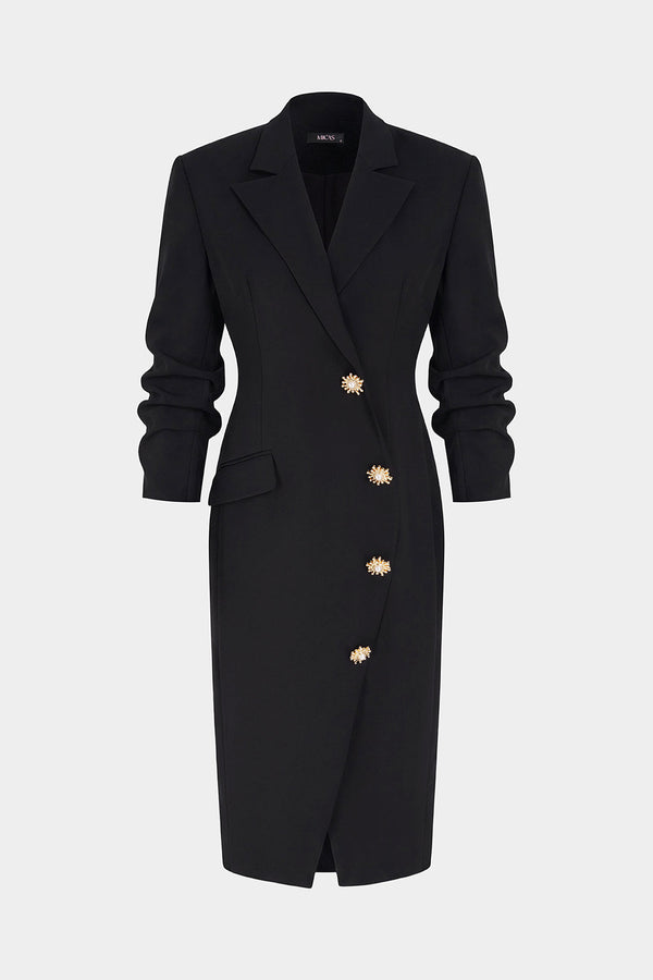 Asymmetrische midi-jurk met metalen details en lange mouwen