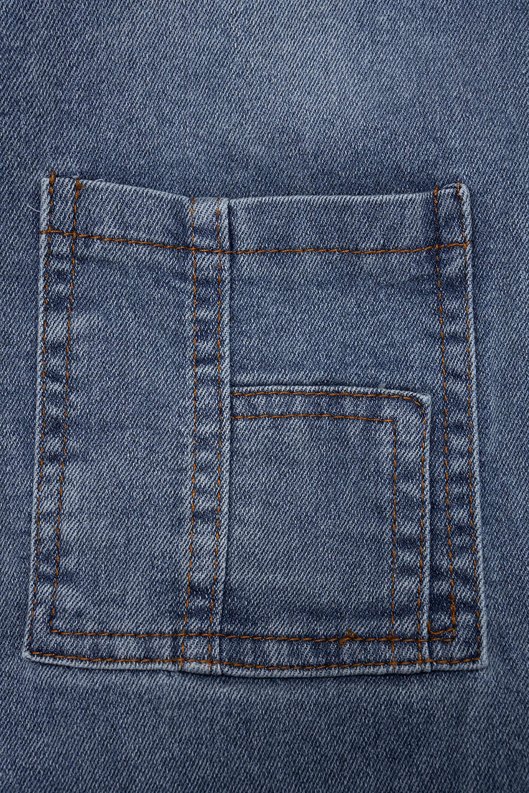 Denim jumpsuit met knoopjes, trekkoord en zakken