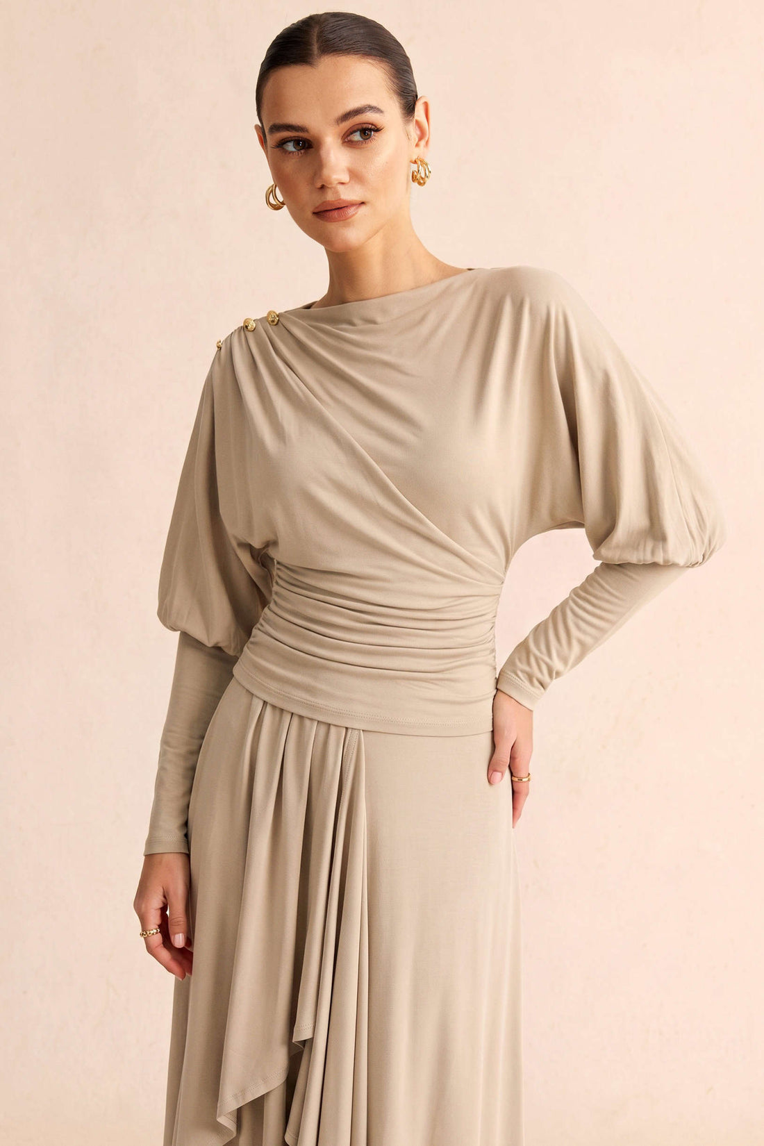 Metallic top met ruches en lange mouwen