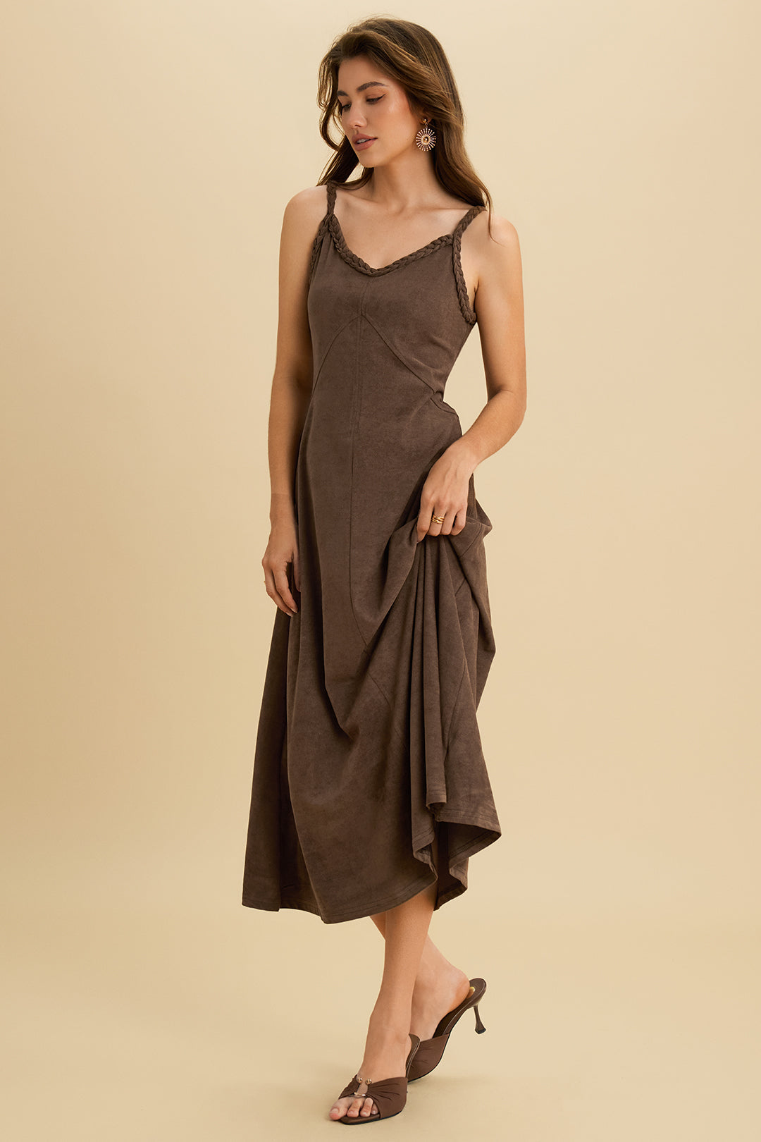 Suède mouwloze midijurk met gedraaid detail en knoopdetail