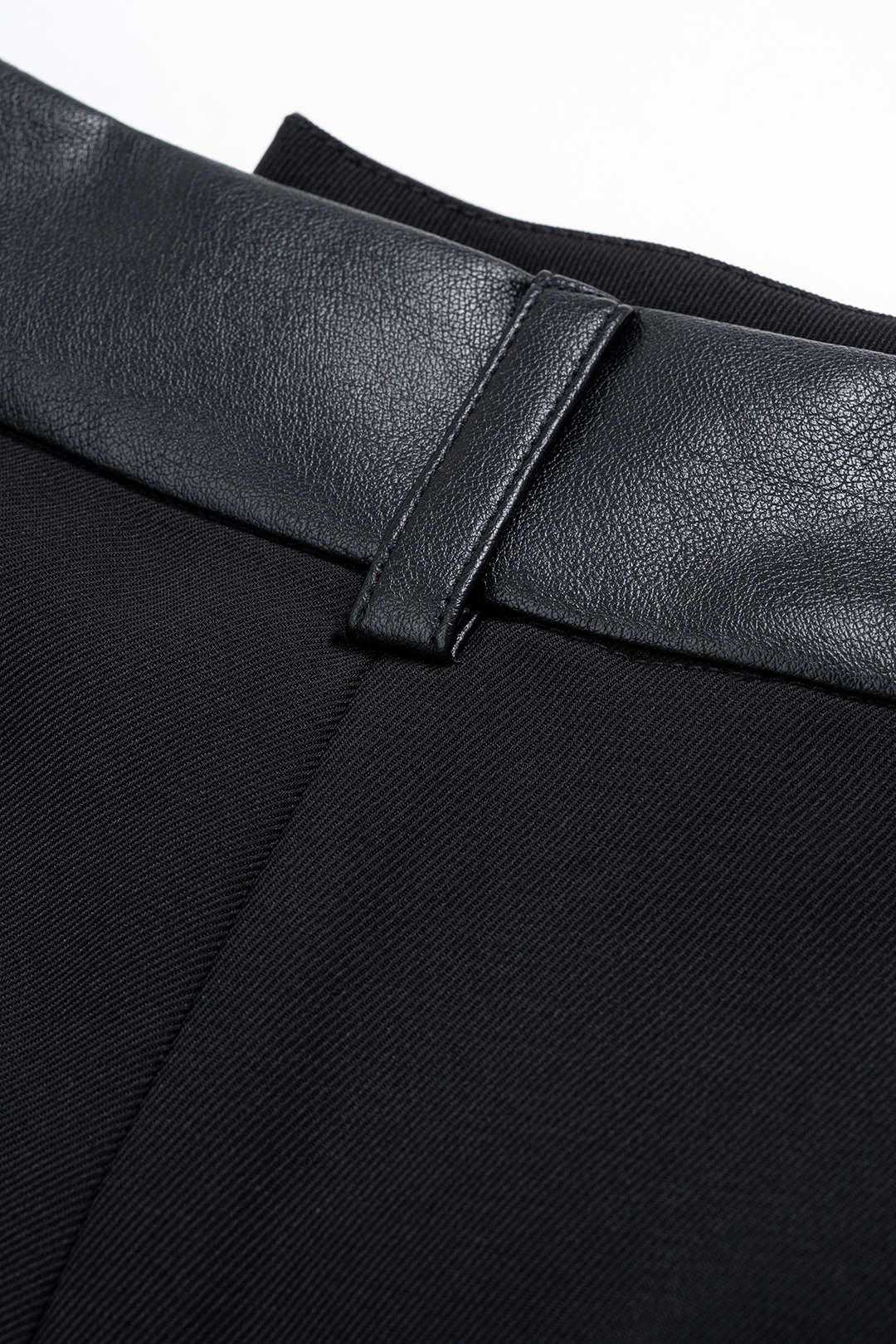 Leren-look patchwork pantalon met wijde pijpen