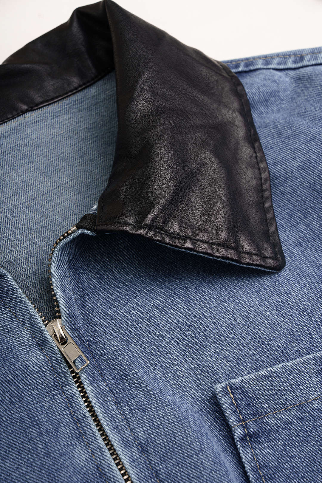 Denim patchwork jumpsuit met zakken en lange mouwen