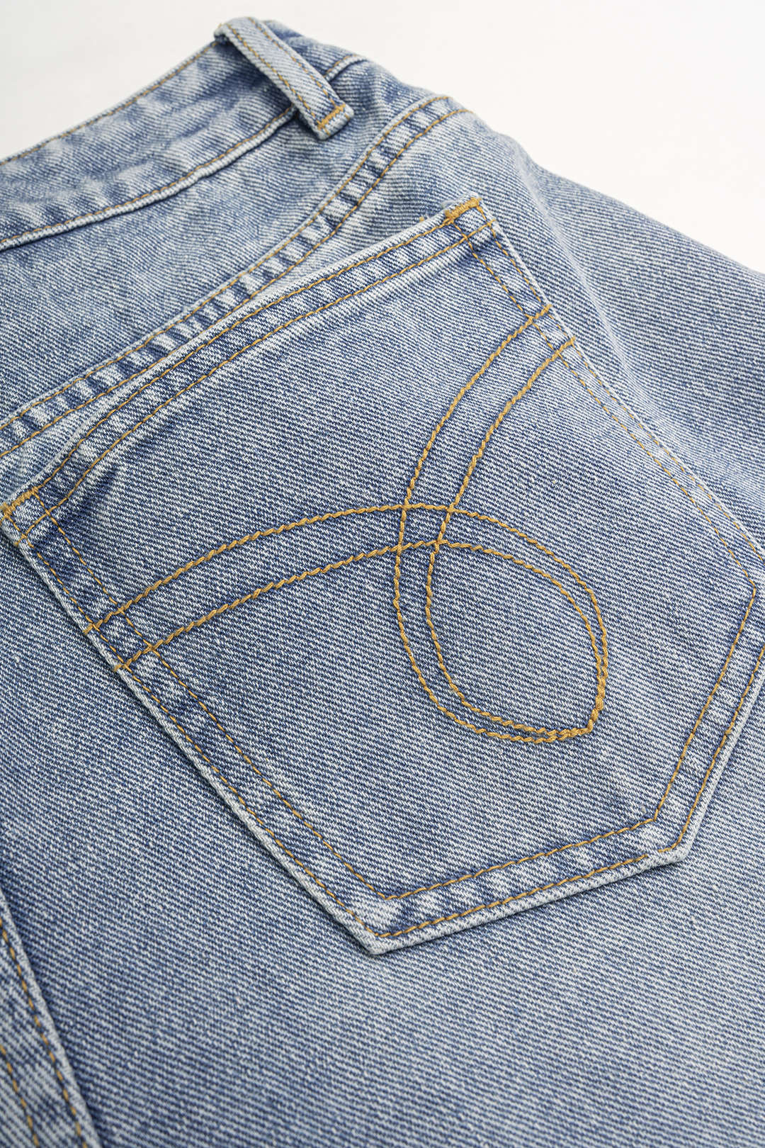 Metallic jeans met knoopjes