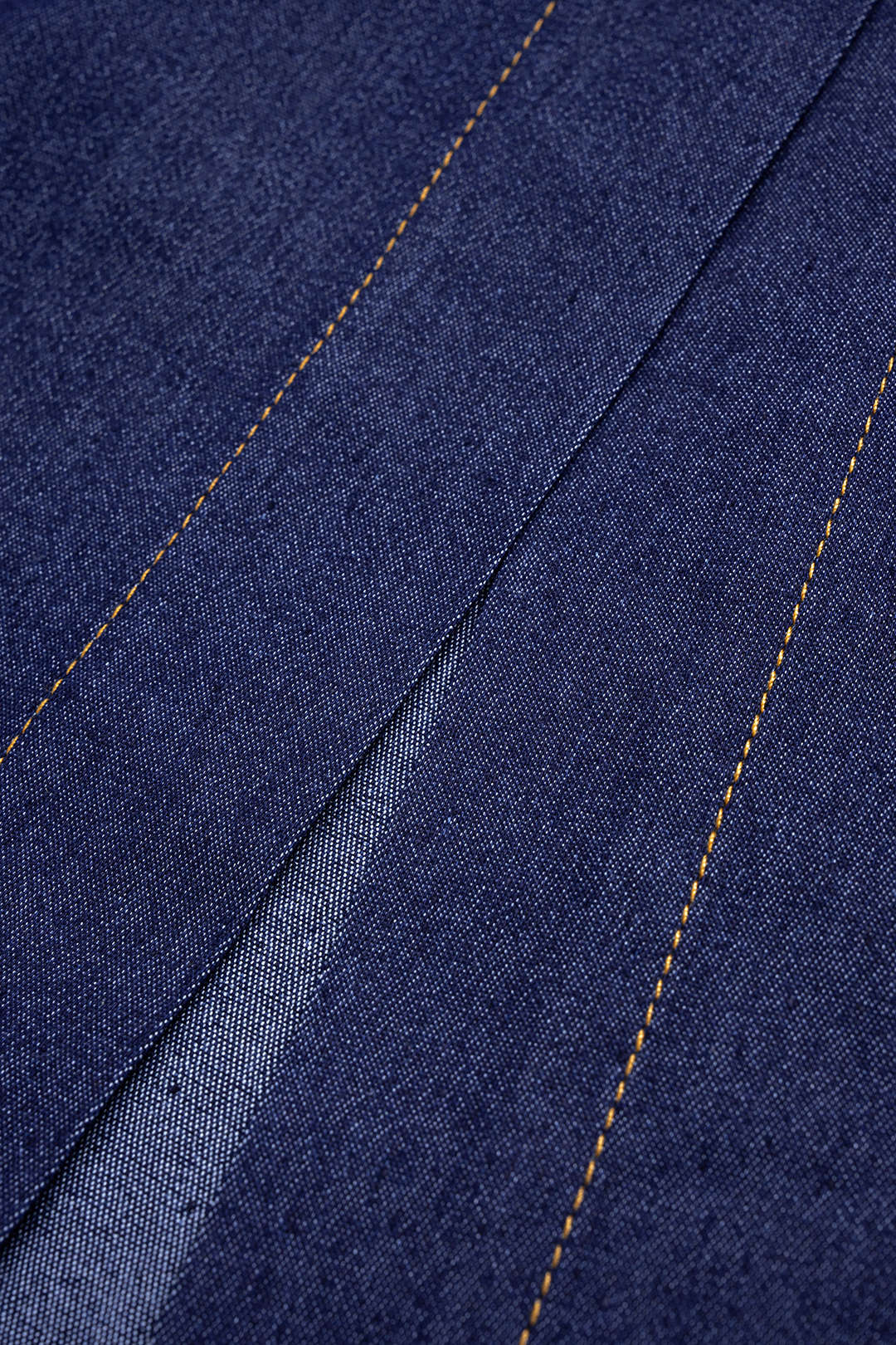 Denim asymmetrische maxijurk met ruches, riem en rits