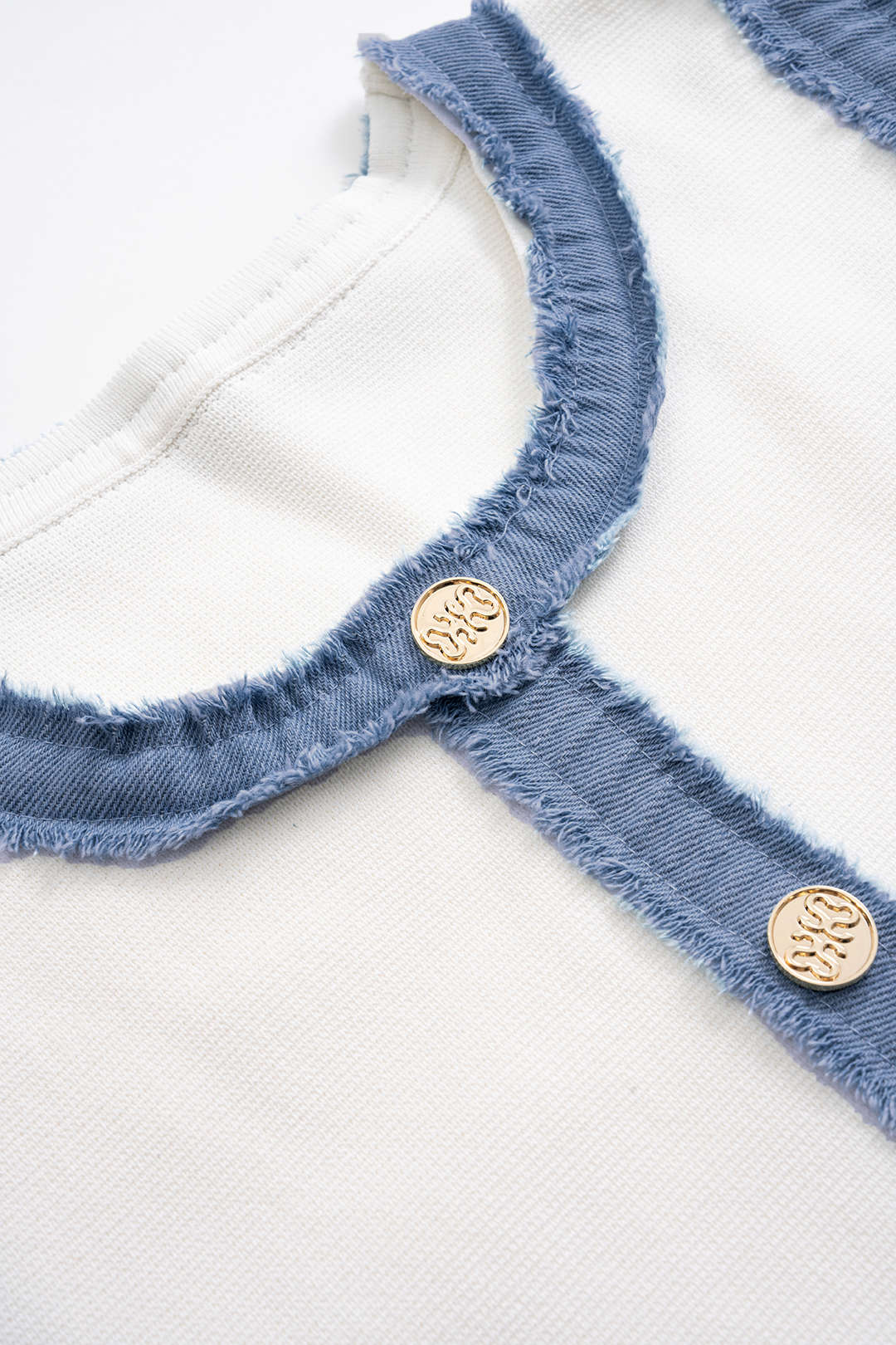 Gebreide patchwork minijurk met knoopjes