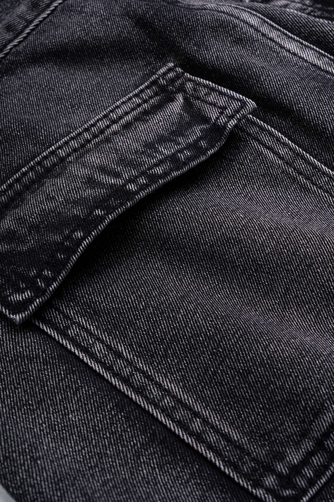 Asymmetrische jeans met zakken en wijde pijpen