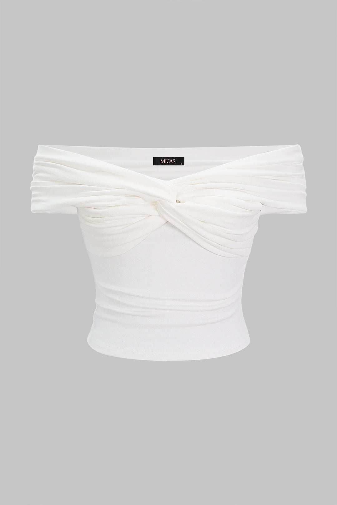 Effen top met gedraaid detail en knoopdetail