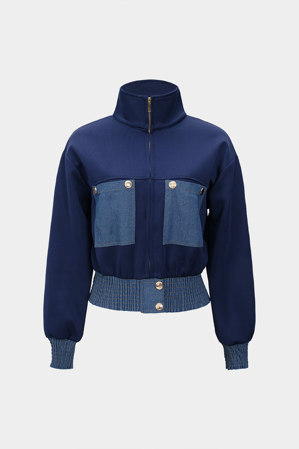 Denim patchwork jasje met smokwerk en rits