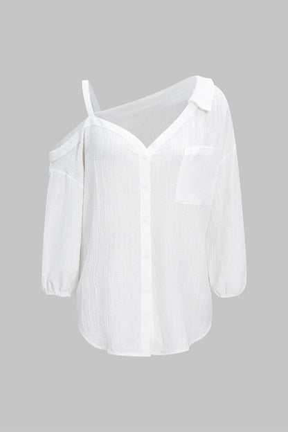 Asymmetrische, mouwloze blouse met knoopsluiting en open rug