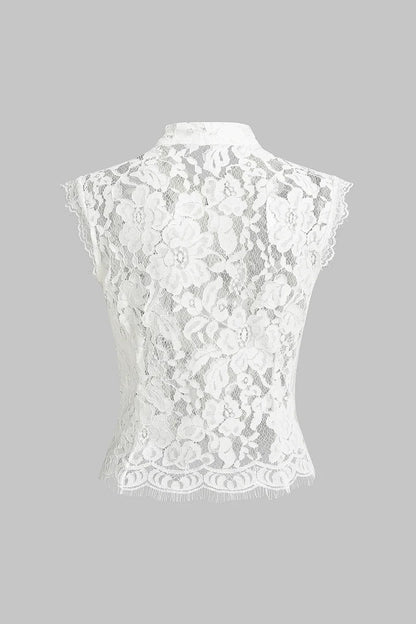 Kanten tanktop met col en knoopsluiting