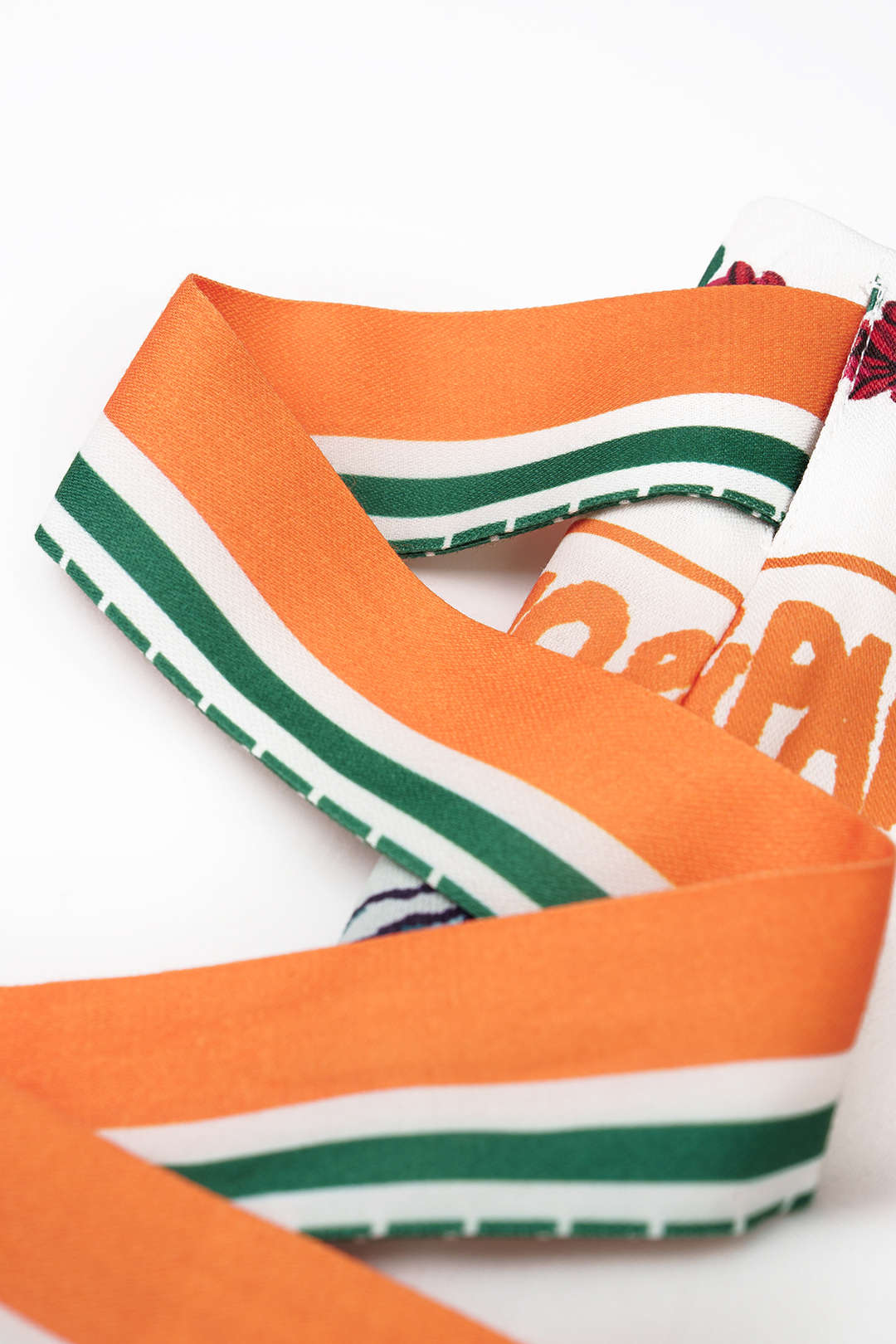 Bloemenprint minirok met knoopdetail en wikkelmodel